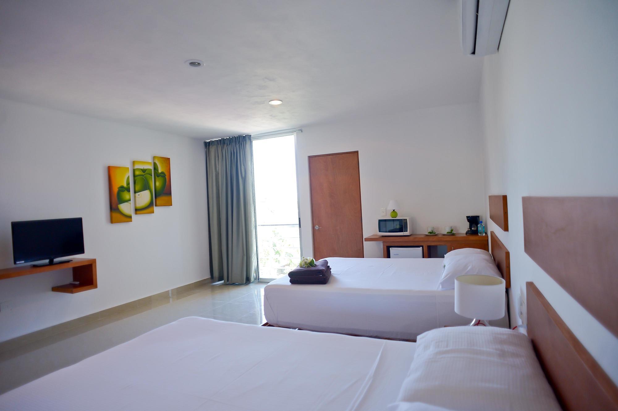 Sunrise 42 Suites Hotel Плая-дель-Кармен Экстерьер фото